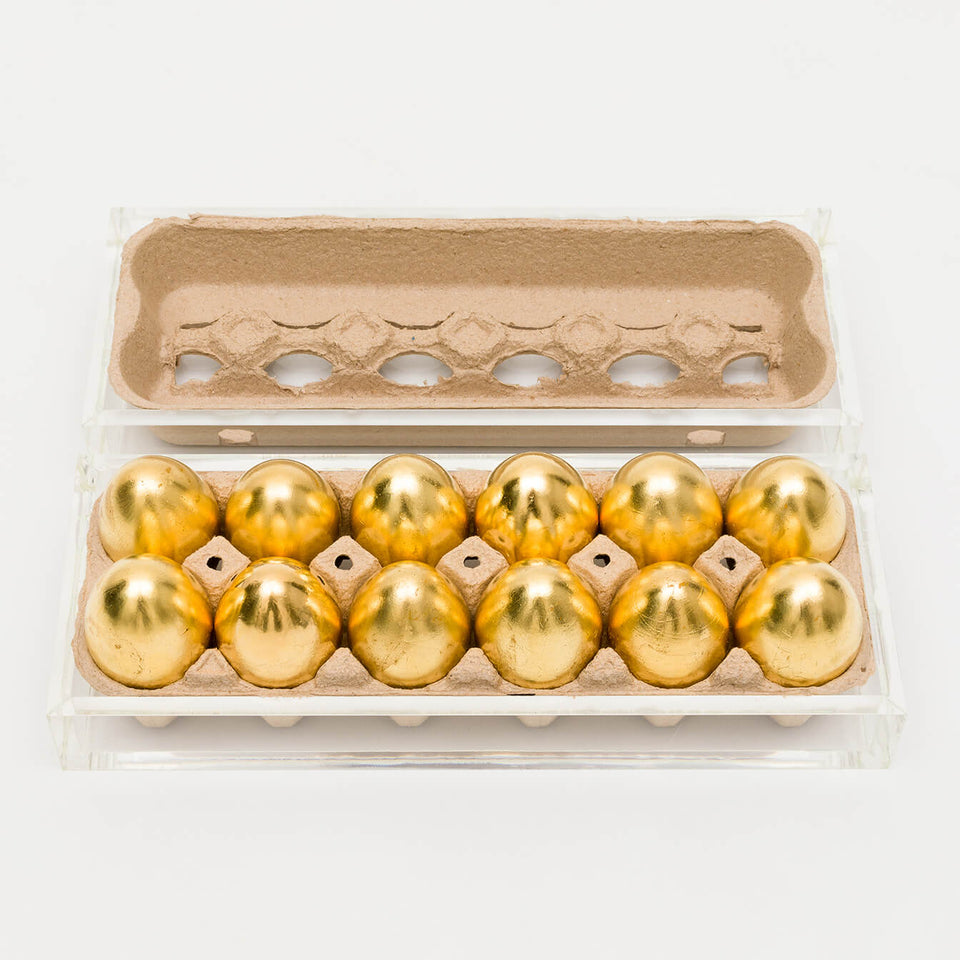 Ovos de ouro - Carbono Galeria