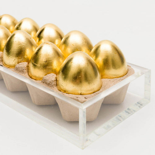 Ovos de ouro - Carbono Galeria