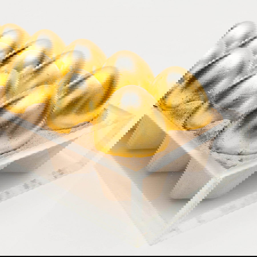 Ovos de ouro - Carbono Galeria