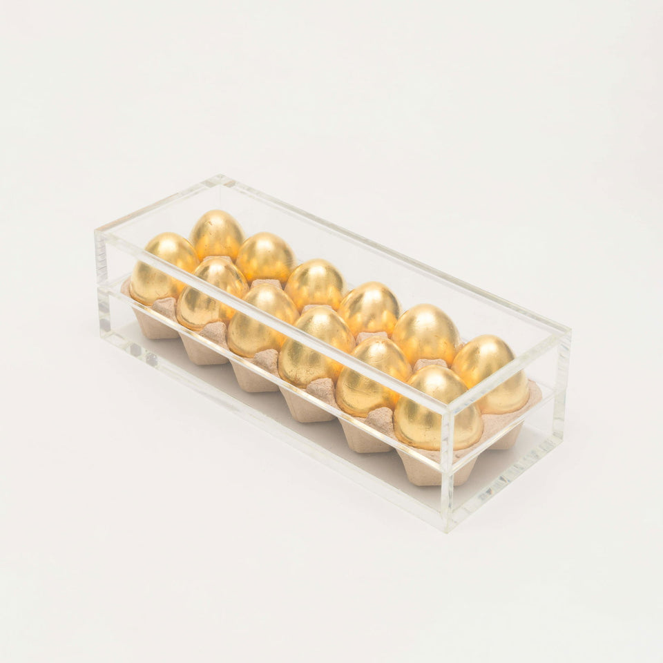 Ovos de ouro - Carbono Galeria