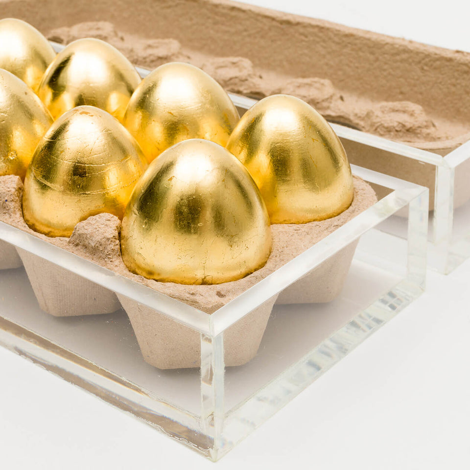 Ovos de ouro - Carbono Galeria